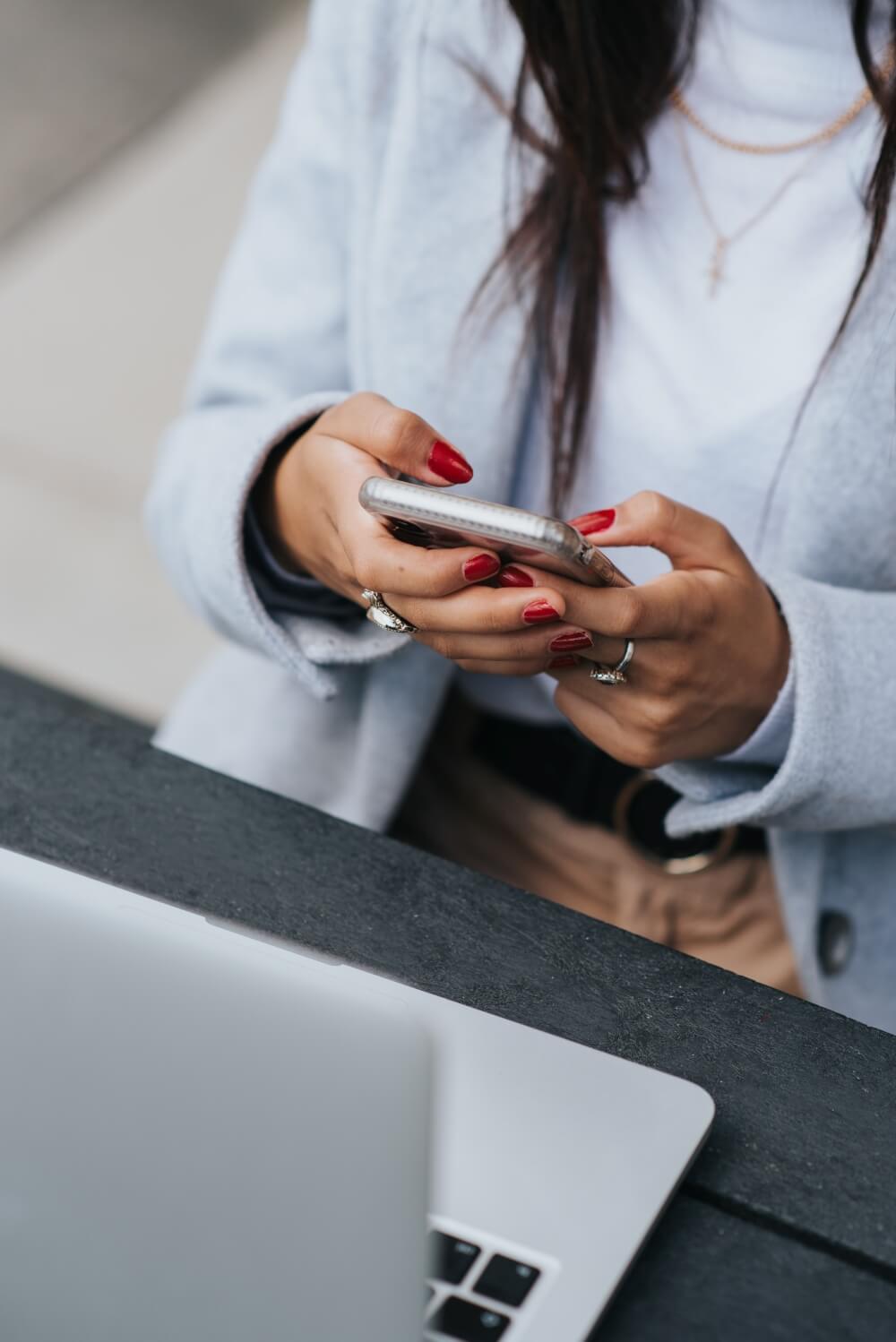 Woman Searching on The Internet How to Hack into Someone's Phone for Free