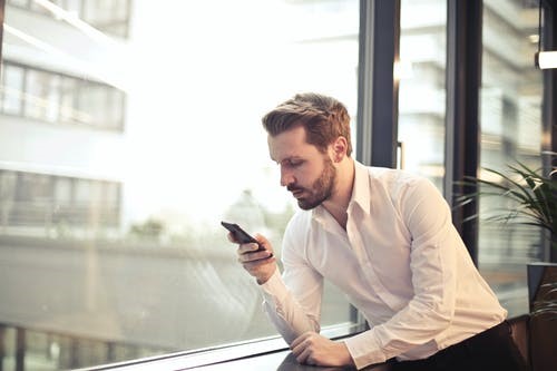 A Man With A Phone for Spy Tracking